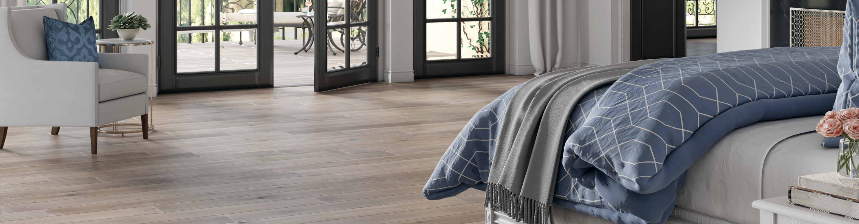 wood look floors in entryway with white front door